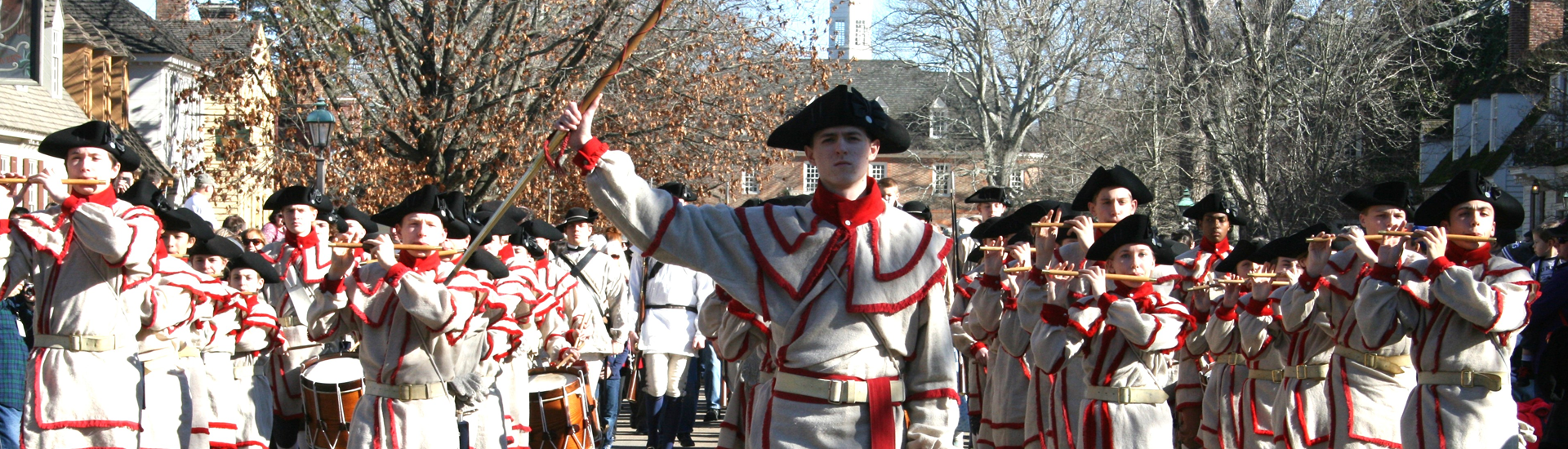 Minutemen reenactment marching in parade in full dress