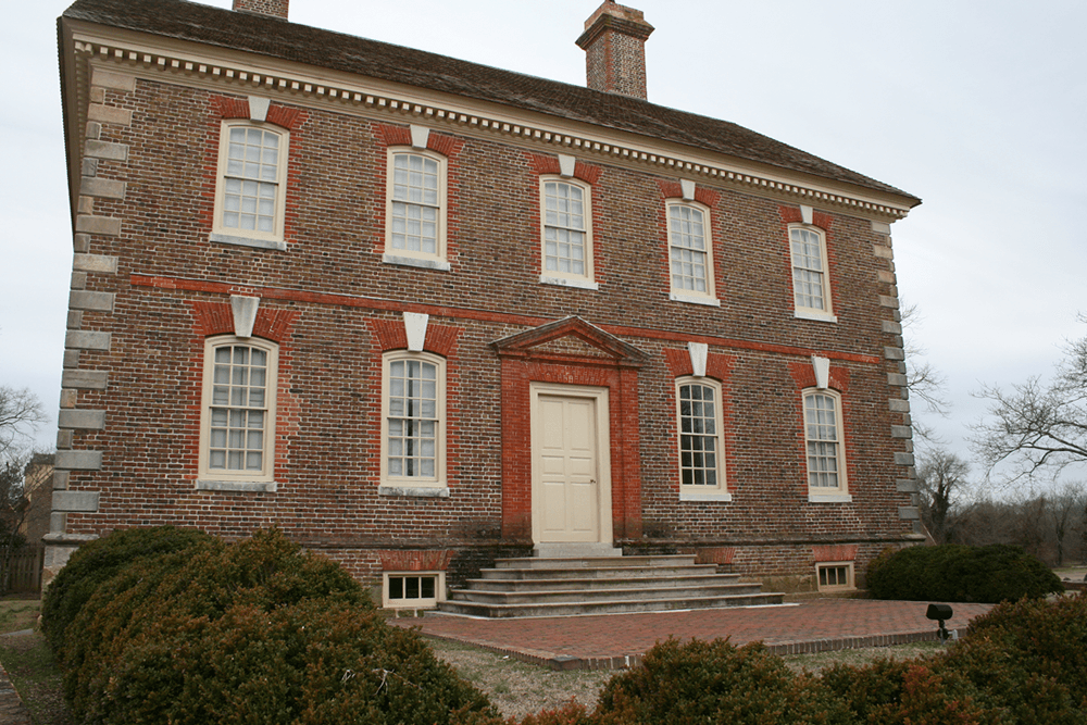 2 story traditional 5, 4 and a door building with cream wood accents